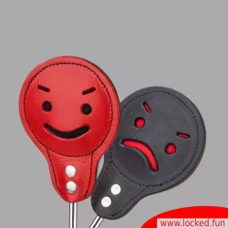 Paddle « Naughty or Nice » en cuir et aluminium.